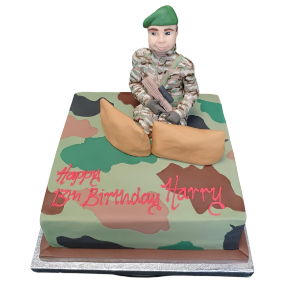 Bespoke soldier-themed cake with detailed uniform decorations, crafted for a celebration in Solihull, West Midlands.