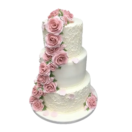 Bespoke celebration cake in Solihull, West Midlands, featuring elegant white icing with gold accents and floral decorations.