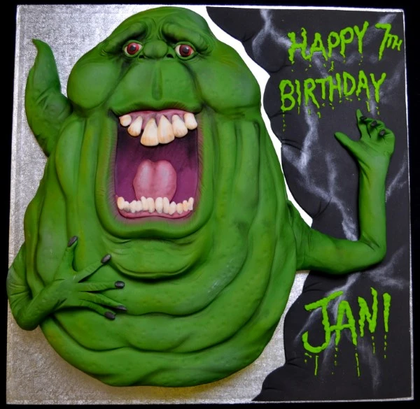 Bespoke Ghostbusters Slimer cake with green slime design for celebration in Solihull, West Midlands.