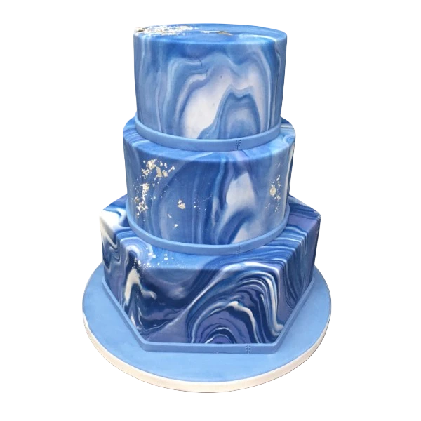 Three-tiered marbled blue wedding cake with gold accents and sugar paste.