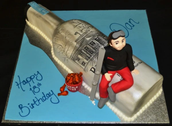 Bespoke celebration cake with intricate floral icing design, crafted in Solihull, West Midlands.