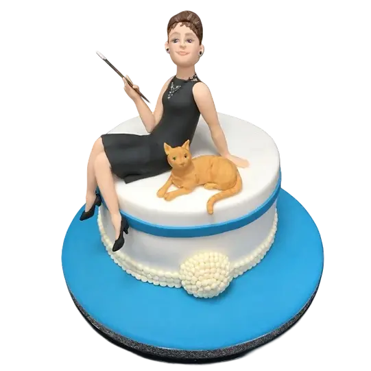 Bespoke Audrey Hepburn celebration cake featuring a black and white portrait with elegant pearl accents in Solihull, West Midlands.