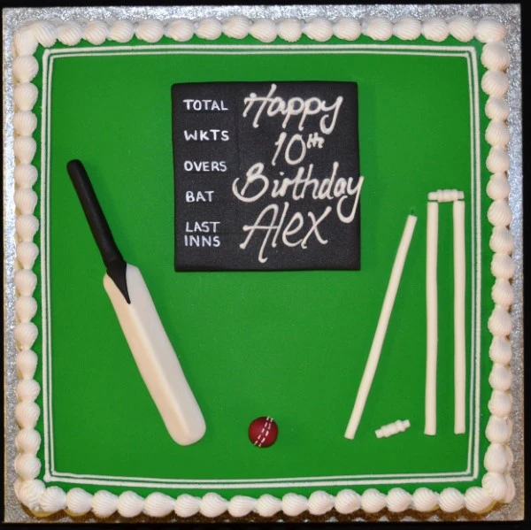 Bespoke single-tier cake with elegant white fondant and delicate floral decorations, Solihull, West Midlands.