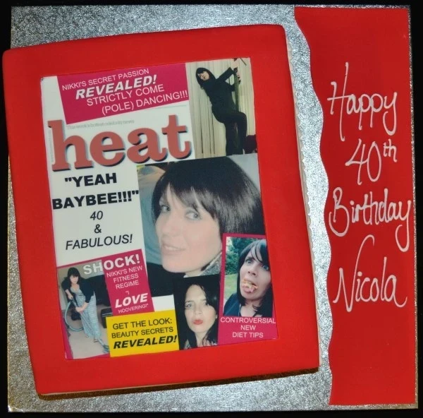 Bespoke cake with intricate floral icing and gold accents, perfect for celebration in Solihull, West Midlands.