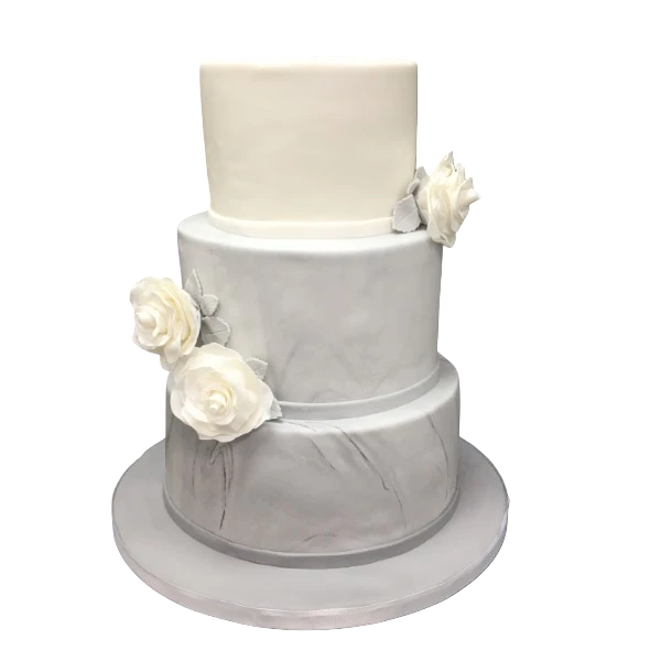 Three-tier marble wedding cake with white sugar paste roses and elegant design.