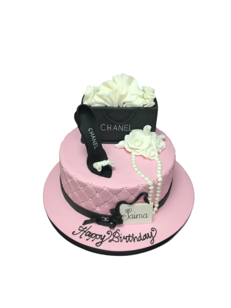 Bespoke Chanel-themed cake with elegant black and white design, featuring the iconic logo in Solihull, West Midlands.