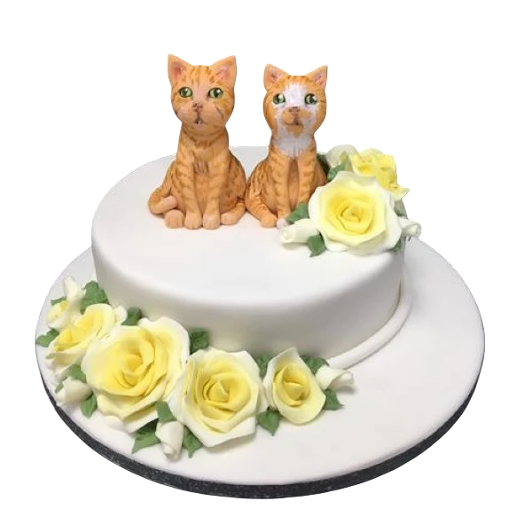 Beautiful cat-shaped cake decorated with delicate pink roses, perfect for animal lovers and special occasions.