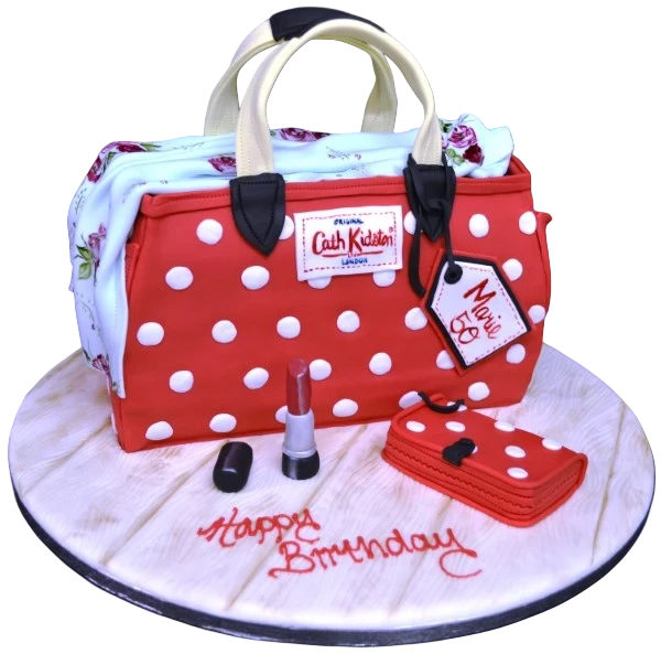 Bespoke Cath Kidston handbag cake with red and white polka dots, crafted for celebration in Solihull, West Midlands.