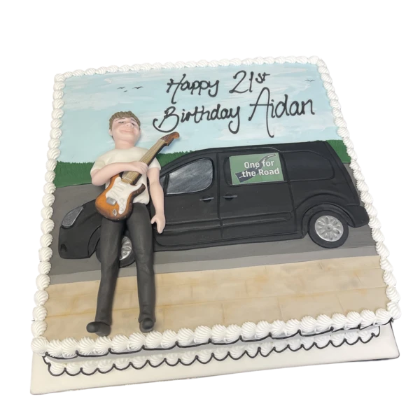 An intricately designed guitar-themed cake with detailed decorations, perfect for music lovers and special occasions in UK.