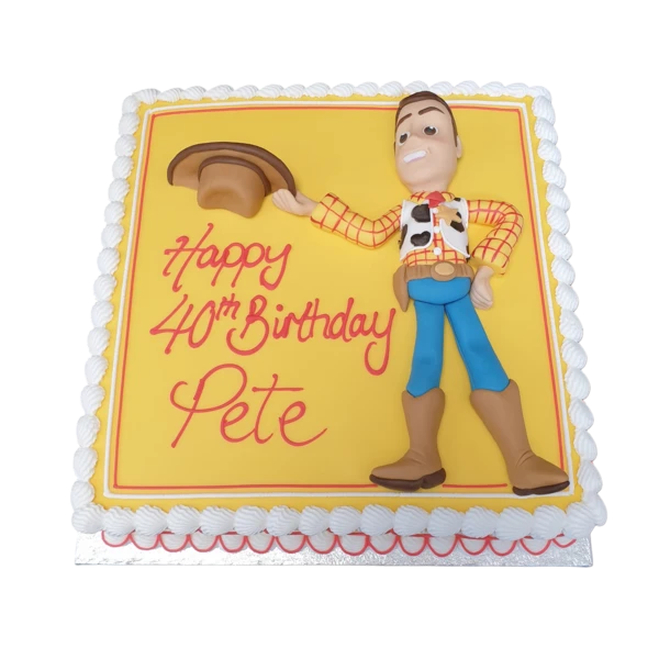 Bespoke Woody-themed celebration cake with detailed fondant figures in Solihull, West Midlands.