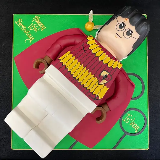 Bespoke Quidditch Harry Potter Lego cake with detailed figures and vibrant colors in Solihull, West Midlands.