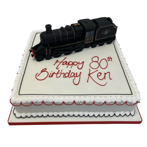 Bespoke model steam train cake with intricate detailing, crafted for a celebration in Solihull, West Midlands.