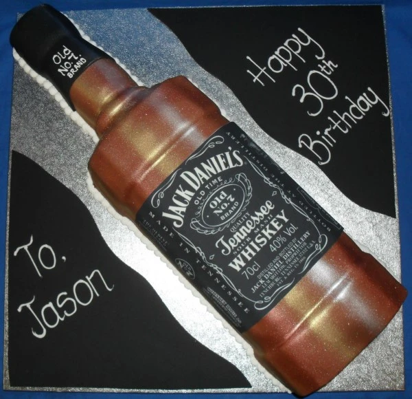 Decadent Jack Daniel's themed cake with intricate details perfect for any whisky lover's celebration.