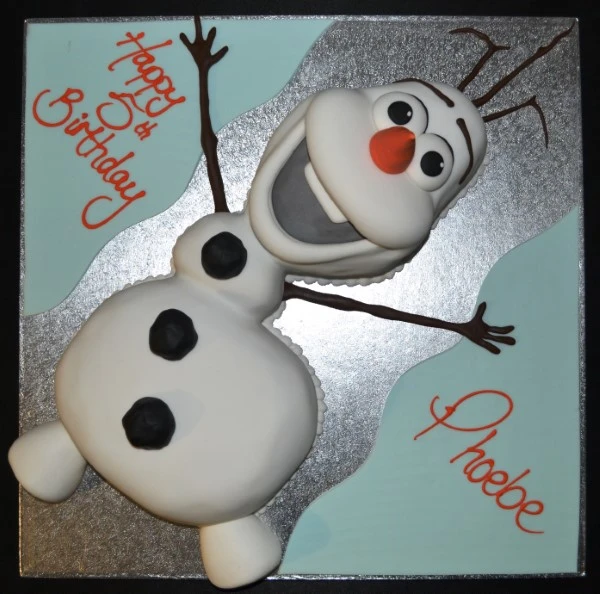 Bespoke Olaf Frozen cake with detailed fondant snowman and icy blue accents, perfect for celebration in Solihull, West Midlands.