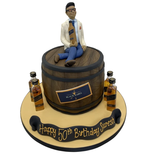 Bespoke celebration cake with elegant white icing and delicate floral decorations in Solihull, West Midlands.