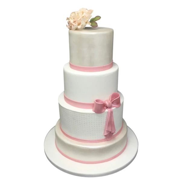 Four-tiered wedding cake with blush ribbons and floral top decoration in sugar paste.