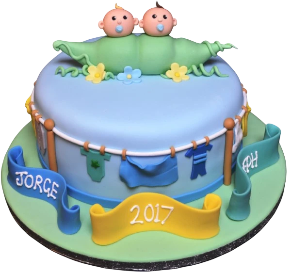 Bespoke cake shaped like two green peas in a pod with smiling faces, crafted in Solihull, West Midlands.