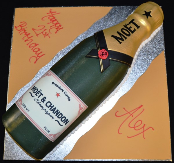 Bespoke cake shaped like a Moet & Chandon champagne bottle for celebration in Solihull, West Midlands.