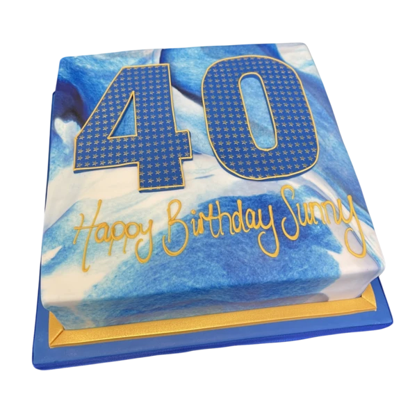 Bespoke royal blue marble number cake with intricate swirls, perfect for celebration in Solihull, West Midlands.