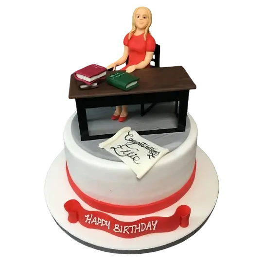 Bespoke cake featuring a detailed lady sitting at a desk, crafted for a celebration in Solihull, West Midlands.