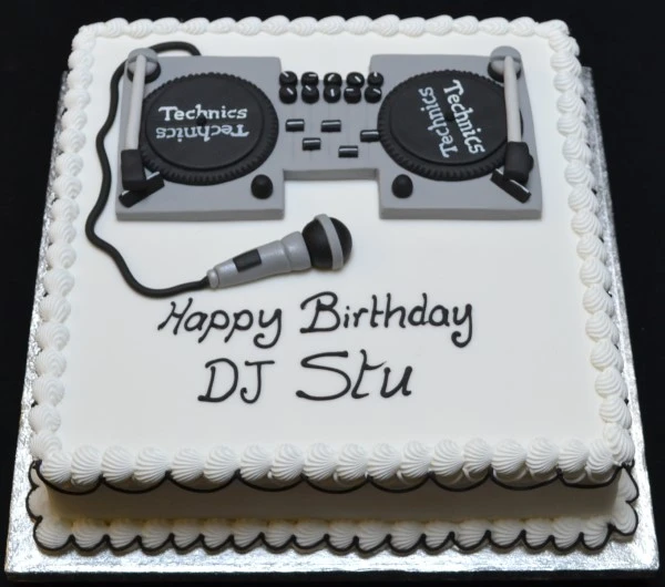 Bespoke DJ deck cake with detailed turntables and mixer design for celebration in Solihull, West Midlands.