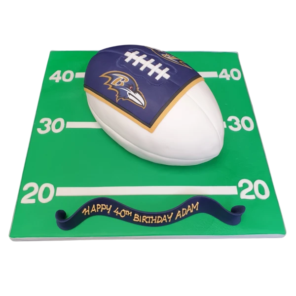Bespoke American Football cake featuring Baltimore Ravens logo, perfect for celebration in Solihull, West Midlands.