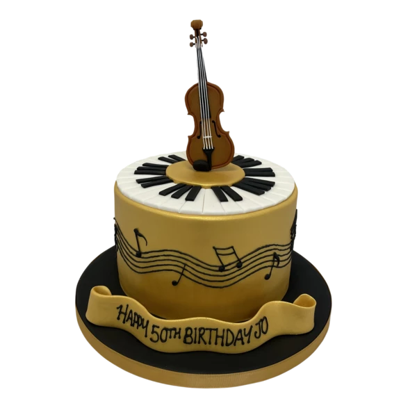 Luxurious gold-themed cake with detailed fondant violin, piano, and musical notes decorations. Perfect for music lovers and special celebrations.