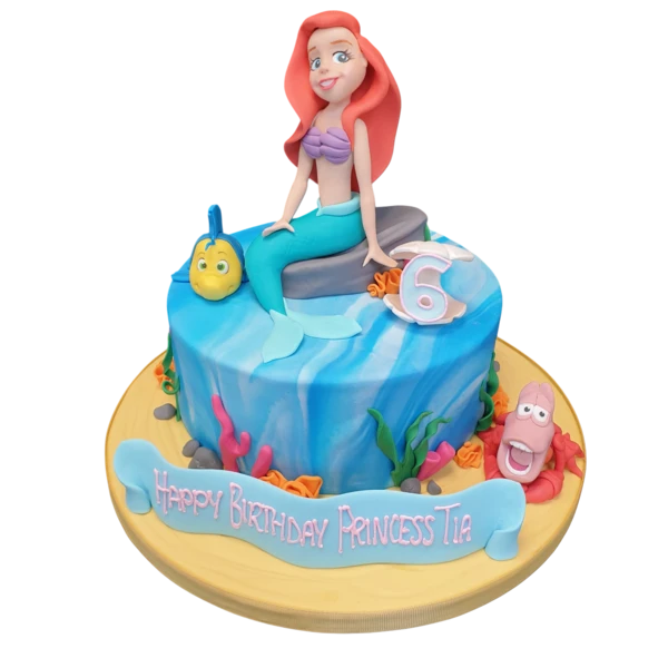 Bespoke Little Mermaid Ariel cake with vibrant ocean-themed decorations in Solihull, West Midlands celebration.