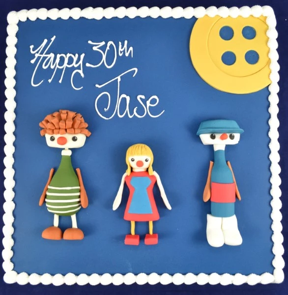 Bespoke Button Moon celebration cake in Solihull, West Midlands, featuring a vibrant moon and star design.