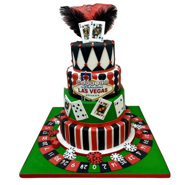 Luxurious multi-tier Las Vegas wedding cake with sugar paste cards and feathers.