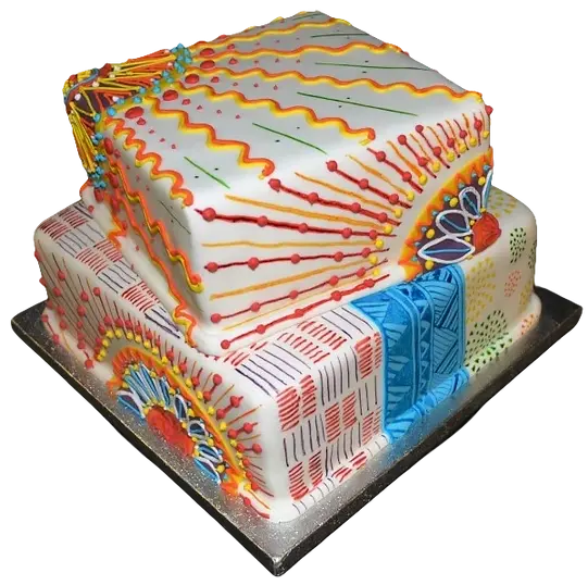 Bespoke cake with vibrant African patterns and geometric shapes, crafted in Solihull, West Midlands for celebration.