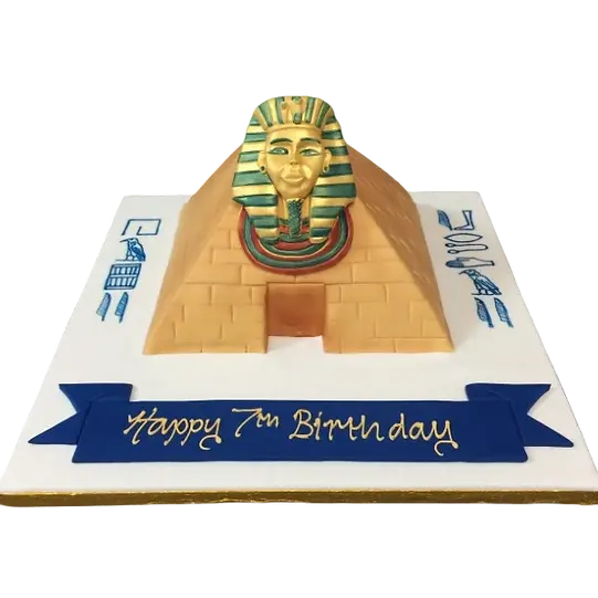 Bespoke pyramid-shaped cake with smooth white icing and gold accents for celebration in Solihull, West Midlands.
