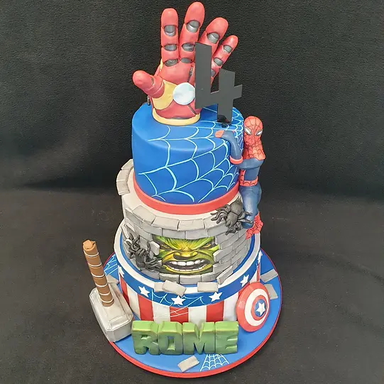 Bespoke Avengers-themed cake with detailed superhero figures and vibrant colors, crafted in Solihull, West Midlands.