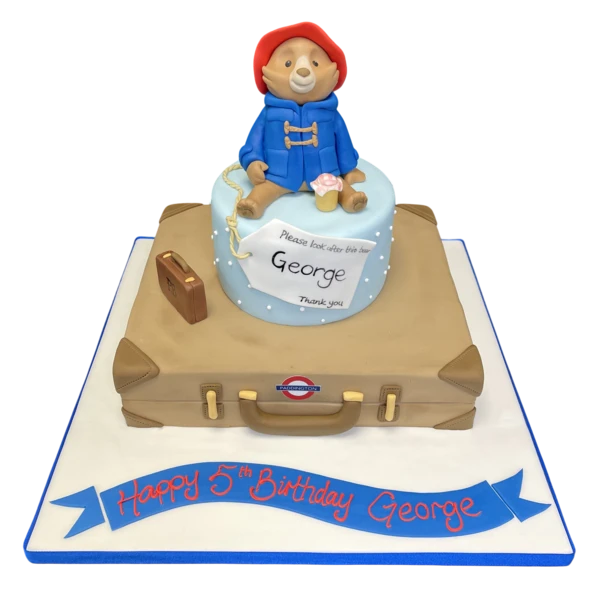 Bespoke Paddington Bear suitcase cake with fondant details and edible accents in Solihull, West Midlands.