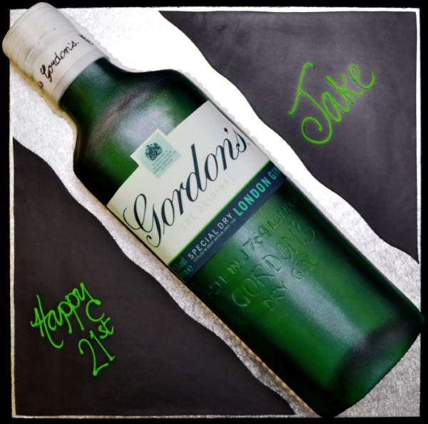 Luxurious and intricately designed cake inspired by a Gordon's Gin bottle, perfect for celebrations and special occasions.