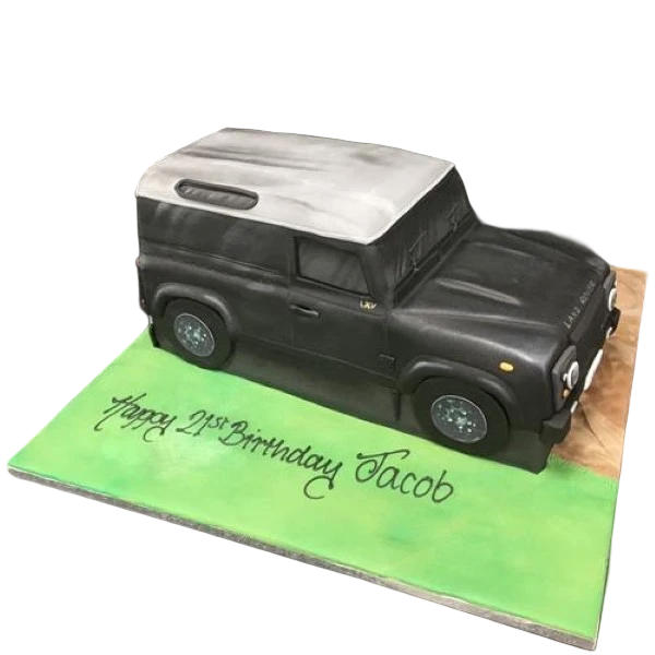 Bespoke Land Rover Defender cake with detailed green fondant design, showcased in Solihull, West Midlands celebration.