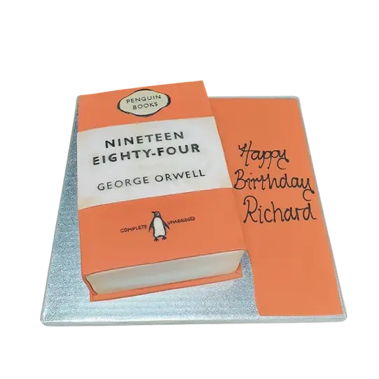 Bespoke cake shaped like the Nineteen Eighty-Four book with detailed cover design, crafted in Solihull, West Midlands.