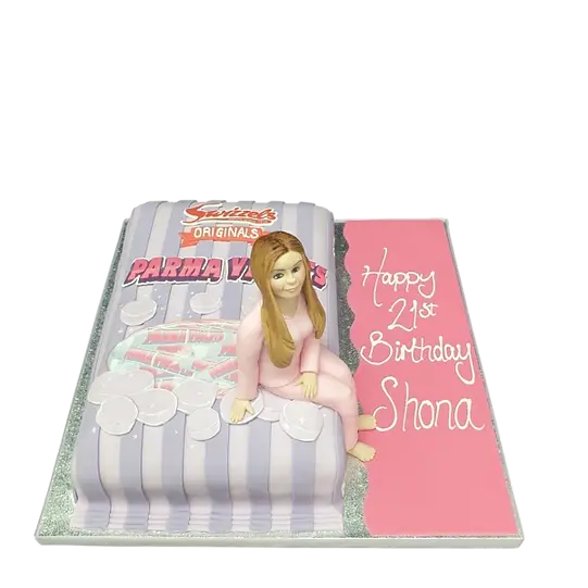 Bespoke Parma Violets celebration cake with pastel purple icing and delicate floral decorations in Solihull, West Midlands.