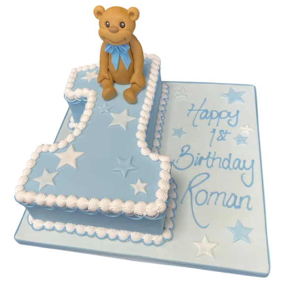 Bespoke cake featuring a teddy bear sitting on a large number 1, crafted for a celebration in Solihull, West Midlands.