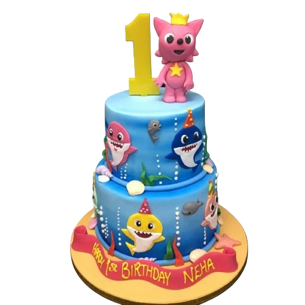 A vibrant and eye-catching Baby Shark-themed cake with two tiers, perfect for a birthday celebration.