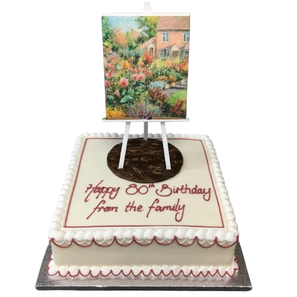 Bespoke celebration cake shaped like an artist’s easel with paintbrush and palette details in Solihull, West Midlands.