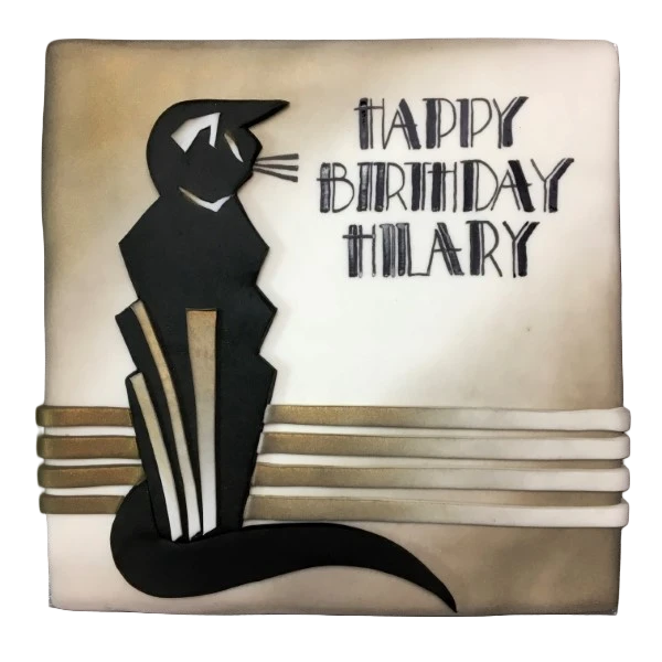 Bespoke Art Deco cat cake with geometric patterns and gold accents, crafted in Solihull, West Midlands.