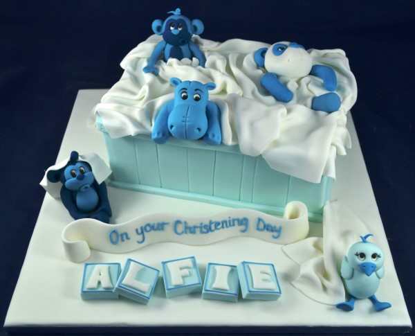 Bespoke toy box cake with colorful edible toys and blocks, crafted for celebration in Solihull, West Midlands.