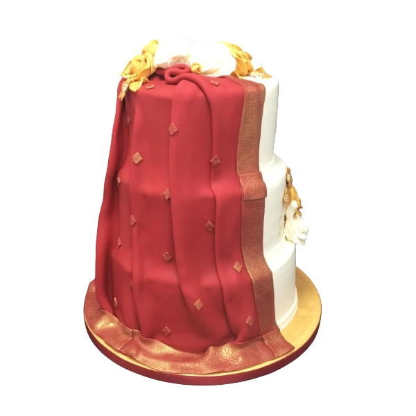 Three-tier wedding cake with red sugar paste drapery and golden accents.