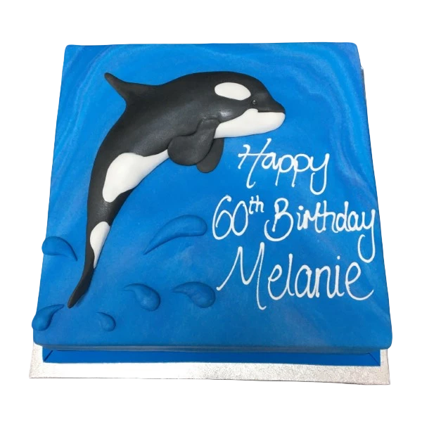 "Beautifully designed killer whale orca themed cake, perfect for ocean lovers. Handcrafted with exquisite attention to detail."