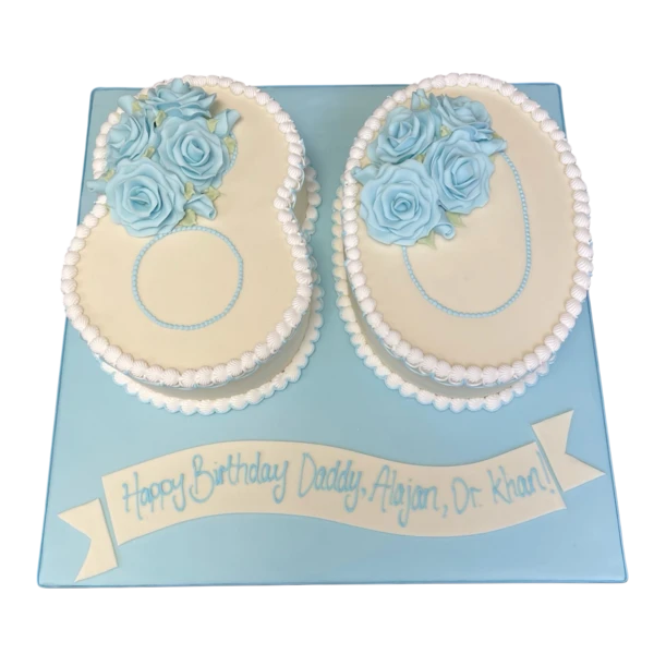 Bespoke number 80 cake decorated with pink and white roses for celebration in Solihull, West Midlands.