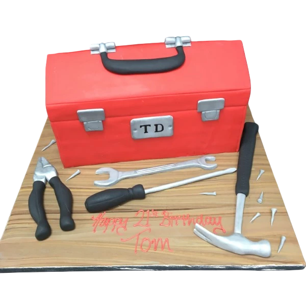 Bespoke toolbox cake with edible tools and realistic details, perfect for celebration in Solihull, West Midlands.