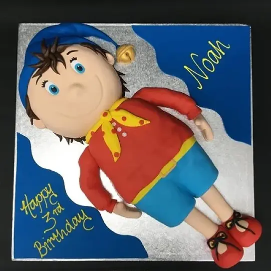 Bespoke Noddy-themed cake with colorful fondant figures and detailed decorations, crafted in Solihull, West Midlands.