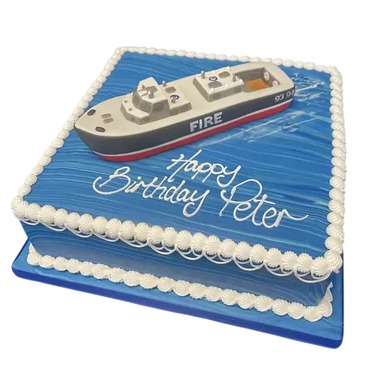 Bespoke fire boat model cake with detailed red and white design, perfect for celebration in Solihull, West Midlands.