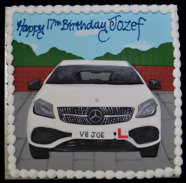 Luxurious and realistic Mercedes car front cake with intricate details, perfect for car enthusiasts and special occasions.